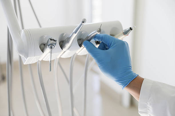 Professional Tooth Extraction technician working in San Juan Bautista, CA